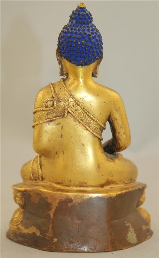 A Sino-Tibetan gilt bronze figure of Sakyamuni Buddha, 15.5cm